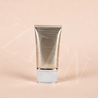 Tube cosmétique ovale plat de 45 mm, 100 à 200 ml, finition brossée horizontale avec bouchon à vis ovale pour les soins de la peau et le toilettage masculin