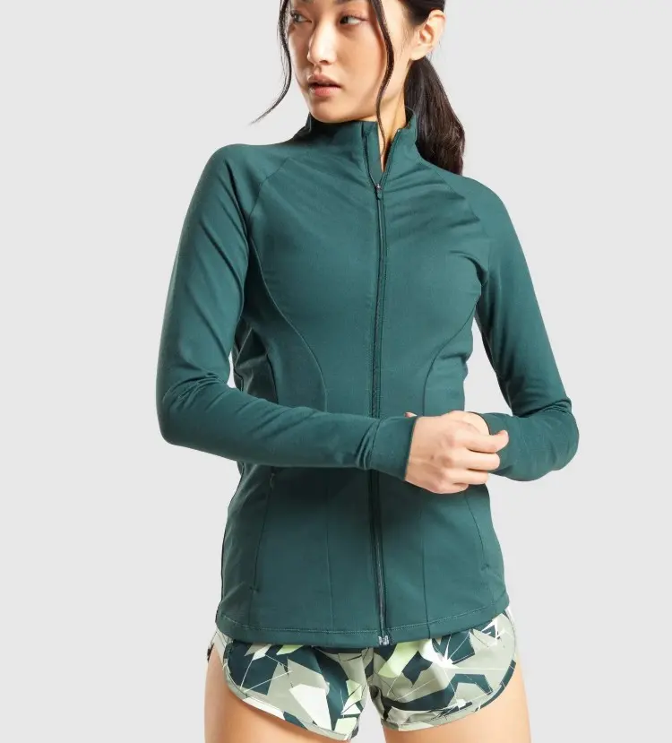 body fit nylon and spandex long sleeve high neck deep zipped pockets zip up ladies training sports athletic jacket women