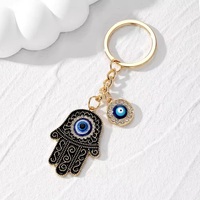 Porte-clés tendance œil de démon, main de Fatima, pendentif paume, bijou populaire pour femmes, pour clés de voiture et sacs d'école