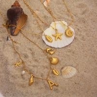 Bijoux fantaisie plaqués or 18 carats en acier inoxydable, collier avec pendentif en forme d'étoile, de coquillage, de lettre, de coquillage, de conque, de coquillage étoilé pour femmes