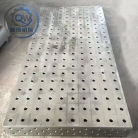 Banc de soudage flexible 3D en fonte stable, table de soudage anti-usure avec outils de positionnement pour le positionnement des gabarits de soudage et la fixation des pièces.