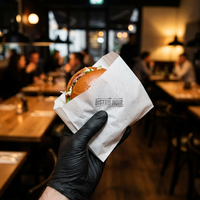 Papier d'emballage alimentaire imperméable et résistant à la graisse de qualité constante pour les applications de snacks, hamburgers et pains, enduit de PE, produit en lot