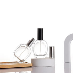 Botella de Perfume de Vidrio Transparente de 50 ml, Recargable, para Viaje, Envase Cosmético con Logotipo Personalizado - Product Image 1