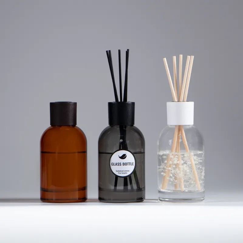 Round shape 200 ml amber black reed diffuser aroma fragrance glass bottle suppliers with wooden cap