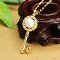 Pendentifs de perles en forme de clé pleins de Zircon bijoux de mode tour de cou en perles pour femmes collier à breloques en perles d'eau douce naturelles