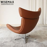 WISEMAX FURNITURE Chaise de loisir pivotante en forme d'œuf au design unique Fauteuil vintage en fibre de verre et cuir en acier inoxydable pour la maison