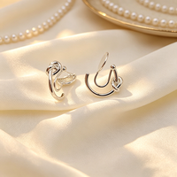 Boucles d'oreilles de luxe en argent à clipser pour femmes, invisibles et indolores, en forme de spirale anti-moustiques, vente directe usine, livraison rapide 2026