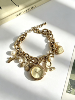 Montre-bracelet vintage élégante en alliage avec breloques pour femme, montre-bracelet à quartz rétro avec papillon et cœur, vente en gros de bijoux-montres