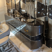 Console haut de gamme incurvée avec miroir en acier inoxydable, meuble d'entrée de luxe pour hall d'hôtel et villa
