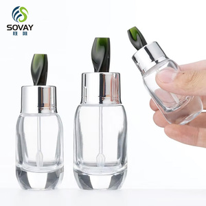 Botellas <span class=keywords><strong>de</strong></span> Vidrio Ovaladas Transparentes <span class=keywords><strong>de</strong></span> 30 ml (1 oz) con Gotero, Envase para Aceites Esenciales, Personalizables con Acabado Esmerilado y Gotero Dorado y Plateado - Product Image 1