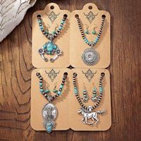 Bijoux de style occidental Navajo Perles Turquoise Chaîne de perles avec déclaration Cheval Vachette Cactus Fleur Concho Pendentif Collier