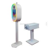 Photomaton ovale DSLR pour iPad avec impression instantanée, boîtier métallique et flight case pour smartphones et appareils photo, idéal pour fêtes, mariages et événements