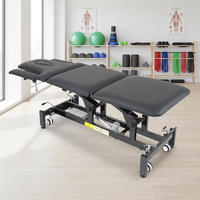 Table de physiothérapie à 5 sections pour la science du sport et la réadaptation, table de massage électrique à levage, table de décompression spinale, canapé d'ostéopathie