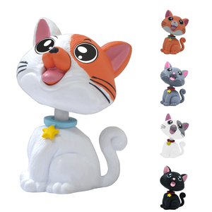 Bobblehead Cat White with Orange Patch is a Cute and Playful Animal Perfect for Your Car Dashboard, Office, Or Home Decor - Product Image 6