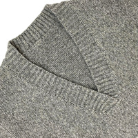 Pull-over ample en maille texturée gris chiné pour femme, col en V profond, épaules tombantes, poignets côtelés, ourlet asymétrique, marque privée