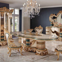 Ensemble de table et de chaises de salle à manger de luxe européenne rectangulaire en bois massif avec feuille d'or noble française pour meubles de villa