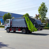 Camion à ordures compacteur Dongfeng Duolika 7m³ Diesel 2.98L pour la collecte des déchets communautaires et industriels