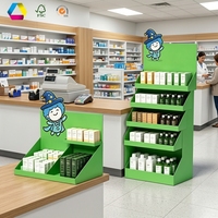 Support d'affichage au sol en carton ondulé personnalisé, présentoir en papier pliable écologique à forte capacité pour la promotion de produits de beauté et de soins de la peau en vente au détail