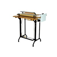 Machine manuelle de scellage et de découpe de sacs plastiques par thermorétraction avec pédale