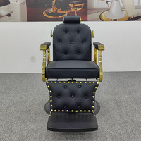 Chaise de salon de coiffure de luxe classique de style antique en cuir noir avec cadre doré et base ronde de haute qualité