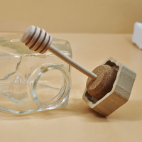 Bocaux en verre hexagonaux de haute qualité de 100 ml, 220 ml et 380 ml avec couvercles en bois pour le stockage du miel, des bonbons et du sucre