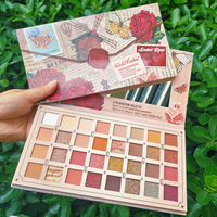 Großhandel 32 Farben DIY Lidschatten-Puder Wasserfester Hochpigmentierter Mineral-Glitter Lidschatten-Palette mit Sechseck-Design