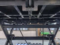 Top 2 tonnes électrique ciseaux niveleur de quai Cargo Table élévatrice plate-forme hydraulique fixe conteneur rampe de chargement pour chariot élévateur