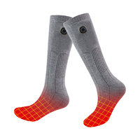 Chaussettes chauffantes montantes personnalisées OEM pour l'hiver, 7,4 V, rechargeables, en coton épais tricoté, avec logo sérigraphié sur mesure pour hommes et femmes