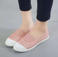 Fabricants vente en gros saisons chaussures simples couleur unie nouvelles dames respirant toile chaussures plates
