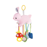 Jouet sensoriel vibrant en peluche pour bébé, lapin en tissu mignon à suspendre avec cordon, idéal pour développer la motricité fine des nourrissons (OEM)