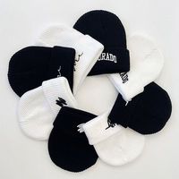 Bonnet d'hiver en tricot personnalisé de créateur avec logo brodé Bonnet de sport unisexe tricoté à la main respirant et imperméable pour le ski