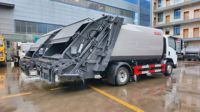 Camion à ordures compacteur Isuzu 4X2 à transmission manuelle, 10 mètres cubes, nouvelle énergie, chargement arrière, vente directe d'usine
