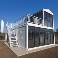 Cette maison conteneur empilable, type Tiny Home, offre une résistance élevée et une étanchéité robuste pour les scénarios extérieurs ou de bureau.