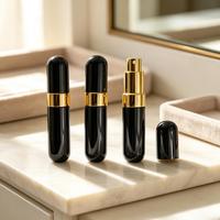Flacon pulvérisateur de parfum portable en aluminium noir brillant à extrémités rondes de 10 ml, rechargeable
