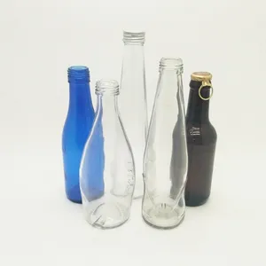 Factory wholesale 500ml clear glass bottle drink glass bottle with screw cap high end mineral water glass bottle
