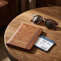 Portefeuille de voyage anti-perte en cuir PU pour femmes et hommes avec emplacement pour AirTags, blocage RFID, porte-passeport
