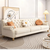 Canapé Chesterfield 3 places en cuir crème minimaliste moderne, rembourrage en éponge, pieds en acier inoxydable, appartement, villa, salon