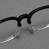 Stock de haute qualité, monture de lunettes en titane Spring Temple Montures de lunettes optiques pures avec logo et design personnalisés