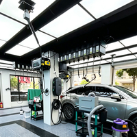 Station de travail complète pour l'esthétique automobile, cabine de lavage de voitures pour garage, espace de travail pour le detailing automobile avec enrouleur de tuyau d'air et grille de drainage au sol