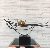 Уникальное металлическое украшение с изображением дерева и птиц
