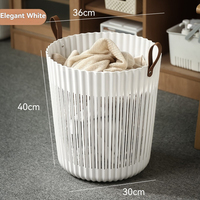 Panier de rangement en plastique ajouré respirant avec poignée en cuir portable pour la lessive, idéal pour l'organisation de la salle de bain et de la chambre