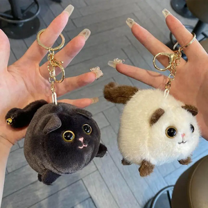 Porte-clés personnalisé avec logo, mini-jouet en peluche chat ou lapin blanc à queue qui bouge, sûr et amusant - Product Image 1
