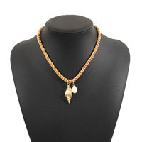Collier ethnique tressé à la main pour femmes Ocean Wind, perles en forme de boule dorée et perles animales en alliage, idéal pour les cadeaux d'été