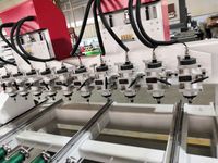 Machine de découpe et de gravure CNC à 4 axes multi-têtes à prix compétitif pour la fabrication de pieds de chaise, de table et de canapé en bois avec certification CE