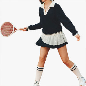 Ensemble de tennis personnalisable avec logo pour femme, col à revers, fermeture éclair, haut décontracté color block et mini-jupe plissée taille haute ajustée pour le sport - Product Image 1