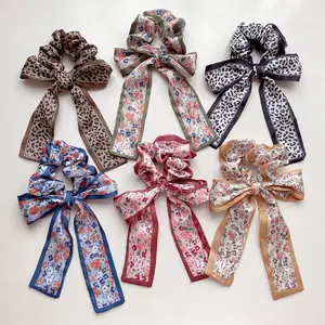 Wholesale bulk logo knotted flower leopard pattern band women elastic hair accessory tie bows hair ribbons for girls hair