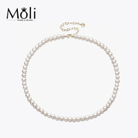 Collier de perles de perles naturelles presque rondes de culture d'eau douce de 6 à 7mm à lustre élevé avec fermoir mousqueton en argent et chaîne d'extension
