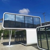 Maison préfabriquée modulaire de style cabane Apple avec structure en acier à assemblage rapide, structure de conteneur, vie moderne et écologique