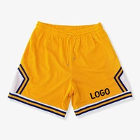 Vente en gros Short de basket-ball pour homme en maille de polyester Short de basket-ball vierge de haute qualité avec broderie personnalisée