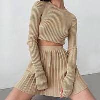 Vêtements de sport décontracté fille Sexy manches longues haut tricoté Mini robe costume femmes pull Tennis 2 pièces jupe ensemble plissé